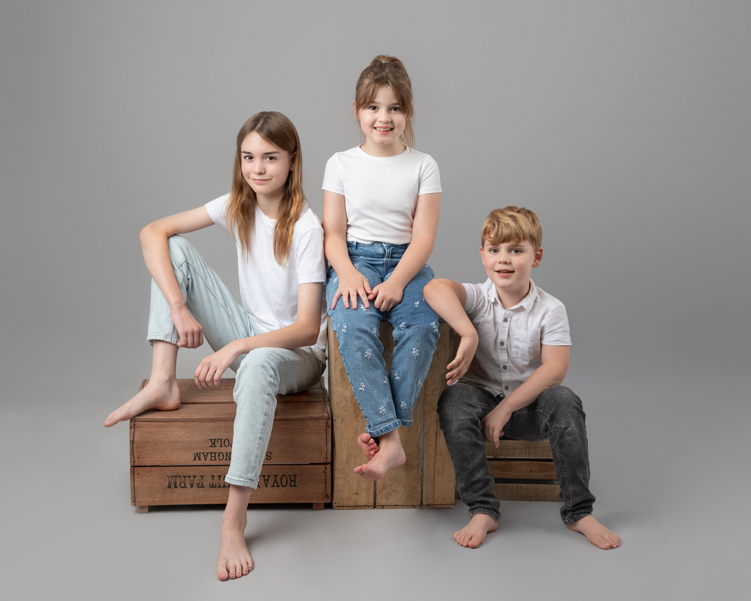 children being photographed in a studio by Family and portrait photography in Wiltshire, Somerset and Bath